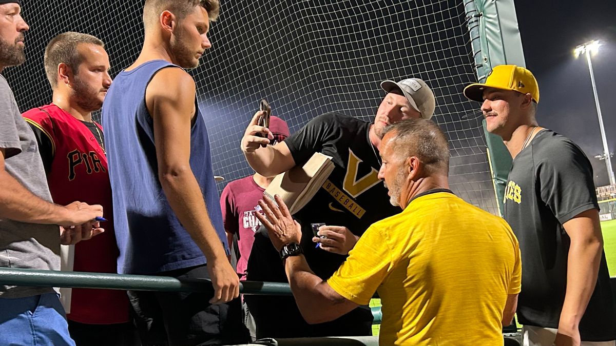 Paul Skenes poses for a photo with a fan following the spring breakout game against the Orioles prospects at LECOM Park in Bradenton. 